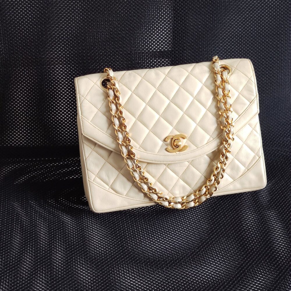SOLD) genuine pre-owned Chanel 1980s vintage half moon flap – Deluxe Life  Collection