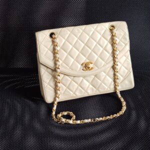 (SOLD) genuine pre-owned Chanel 1980s vintage clutch on chain