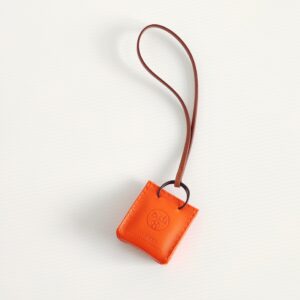 (SOLD) genuine (NEW) Hermès orange bag charm