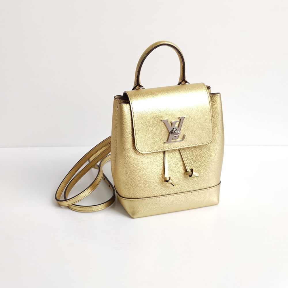 Vuitton Sold Out New Gold Lockme Mini Backpack For Sale at 1stDibs