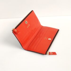 (SOLD) genuine (like-new) Louis Vuitton adele long wallet