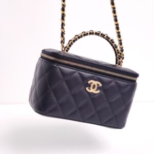 genuine (NEW) Chanel small lambskin vanity with top handle