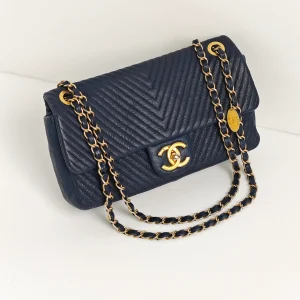 (Unavailable) genuine pre-owned Chanel surpique chevron flap bag