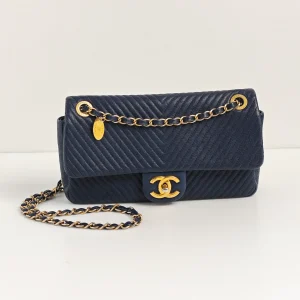 (Unavailable) genuine pre-owned Chanel surpique chevron flap bag