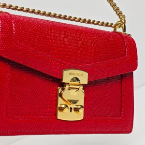 genuine (almost-new) Miu Miu trunk lock chain flap bag