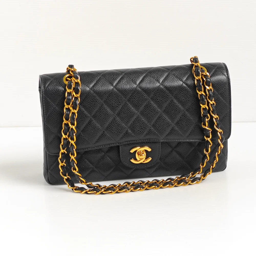genuine pre-owned Chanel medium classic flap - black caviar 24k ghw