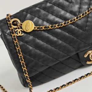 genuine pre-owned Chanel large surpique chevron flap bag