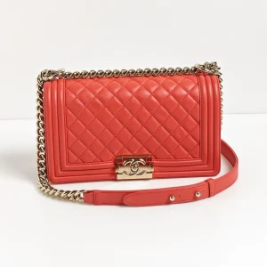 genuine (like-new) Chanel coral calfskin medium (25cm) boy bag