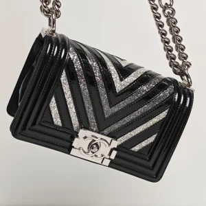 genuine pre-owned Chanel glitter chevron small boy bag