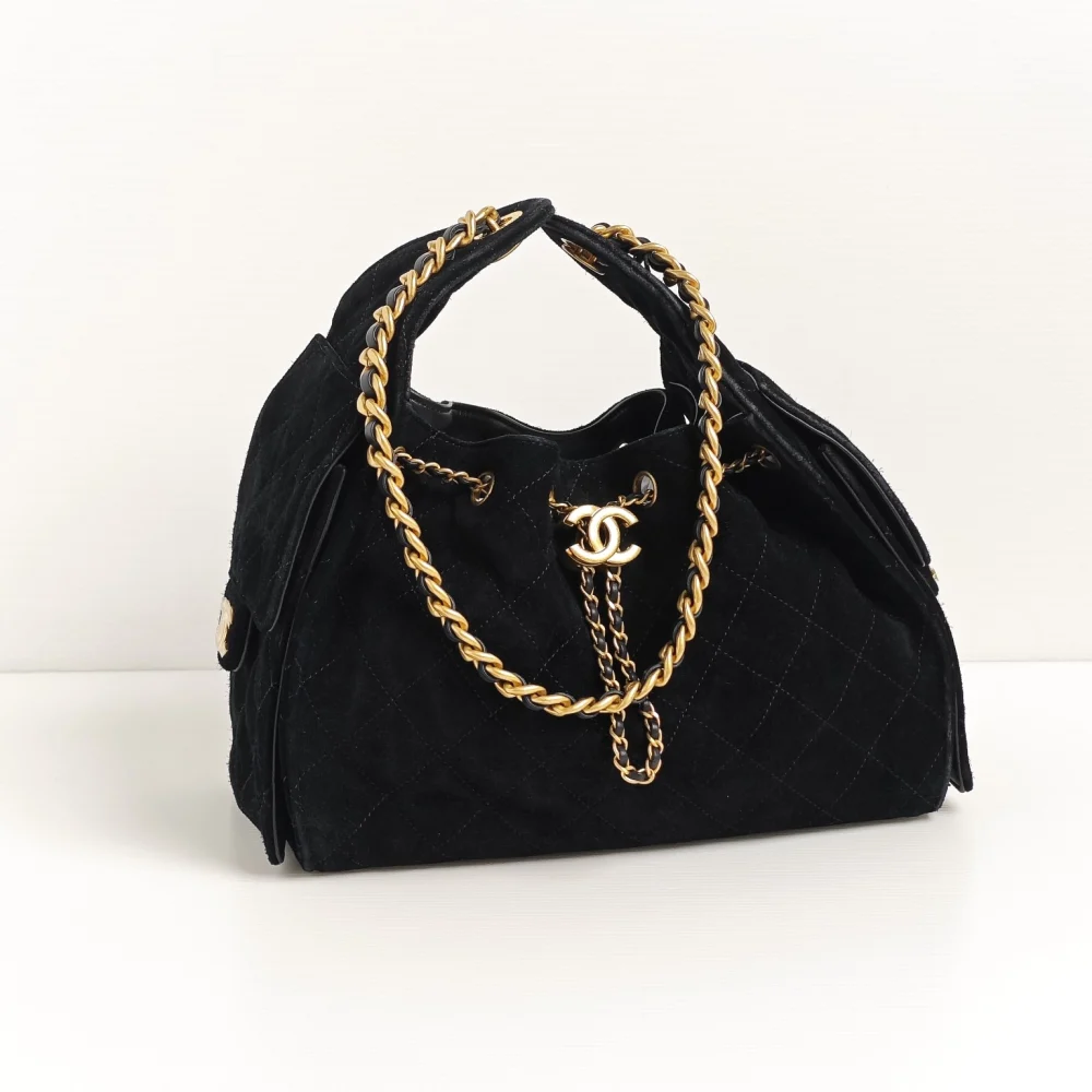 genuine pre-owned Chanel 25 small black suede